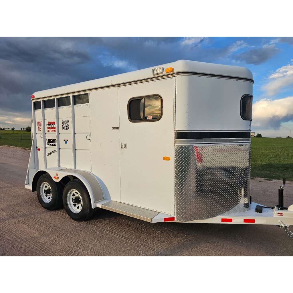 Side view of a white 2-horse slant trailer rental in Colorado Springs